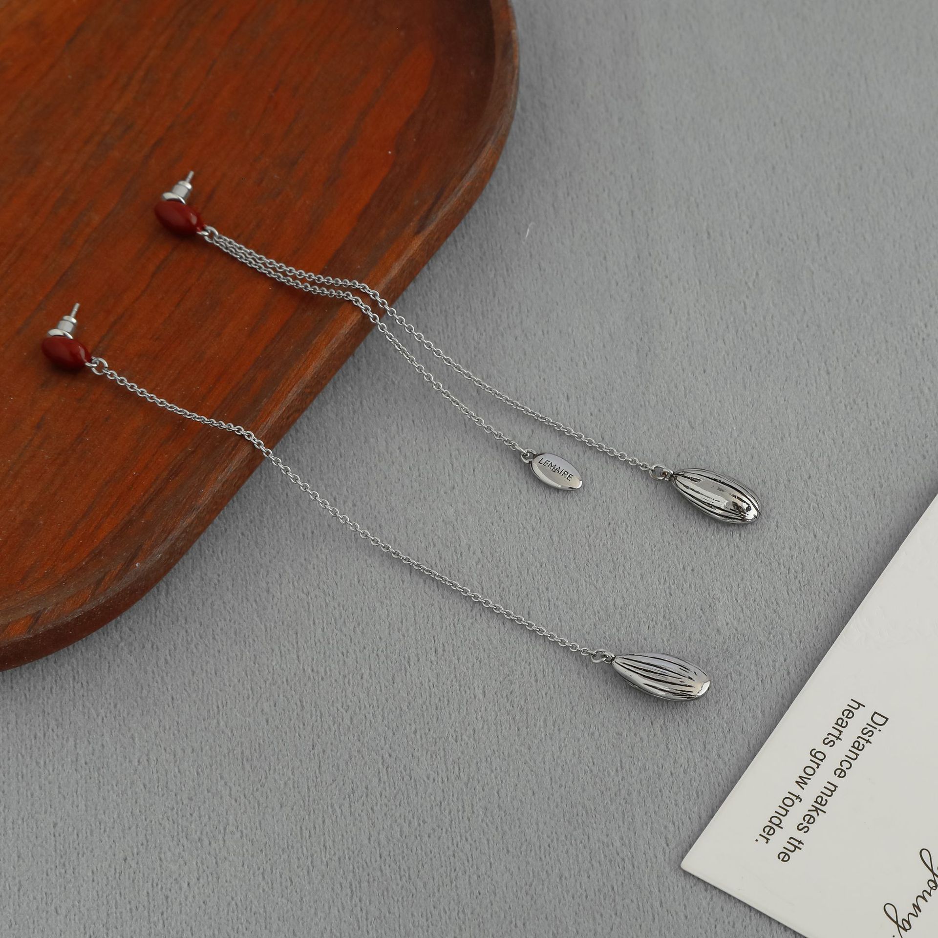 LEM*家银色瓜子流苏耳钉 夏季新款向日葵种子珐琅不对称流苏耳钉详情7