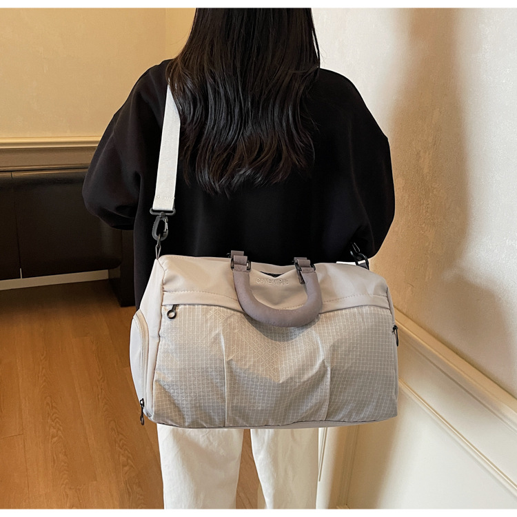 短途旅行包女轻便多功能斜挎运动健身包手提出差大容量收纳行李袋详情30