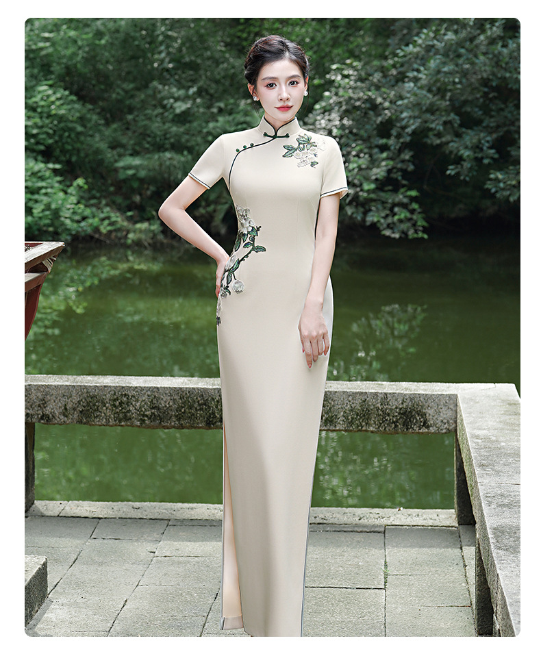 The new national trend cheongsam fashion show performance dress, short-sleeved slimming etiquette figure performance dress, is full of greenery pic 9