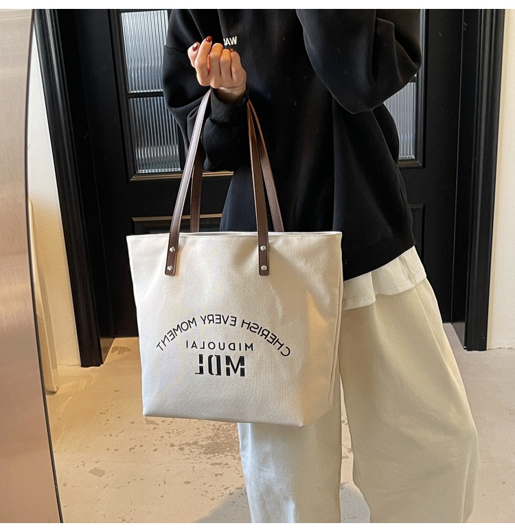 Large-capacity 2025 new style simple single-shoulder hand-carry cloth bag, college student class tote bag, versatile canvas bag for women pic 4