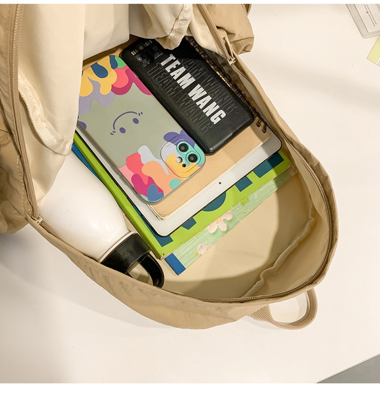 新款时尚轻便简约双肩包女日系文艺学生书包休闲运动旅行纯色背包详情52