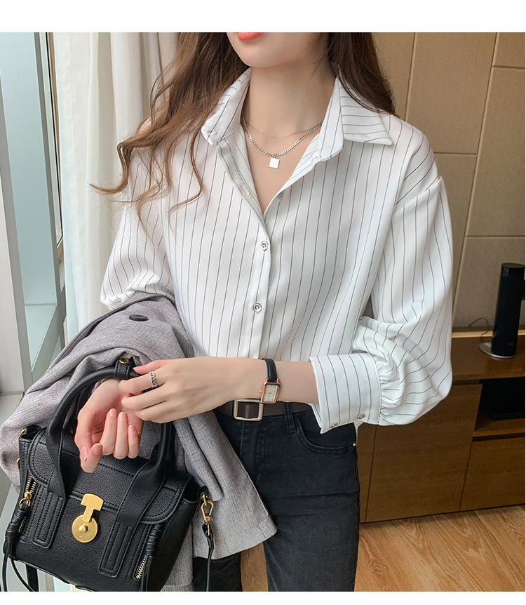 This vertical striped chiffon shirt for women with three-quarter sleeves is a new autumn collection. It features a unique and mature design with a sense of elegance and drape pic 25