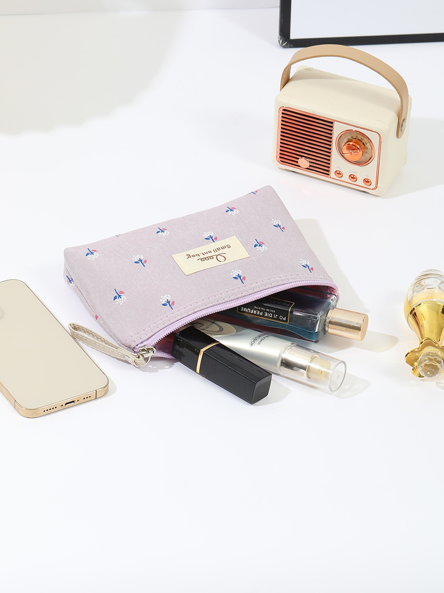 跨境印花帆布化妆包女防水便携ins风字母学生笔袋旅行收纳洗漱包详情14