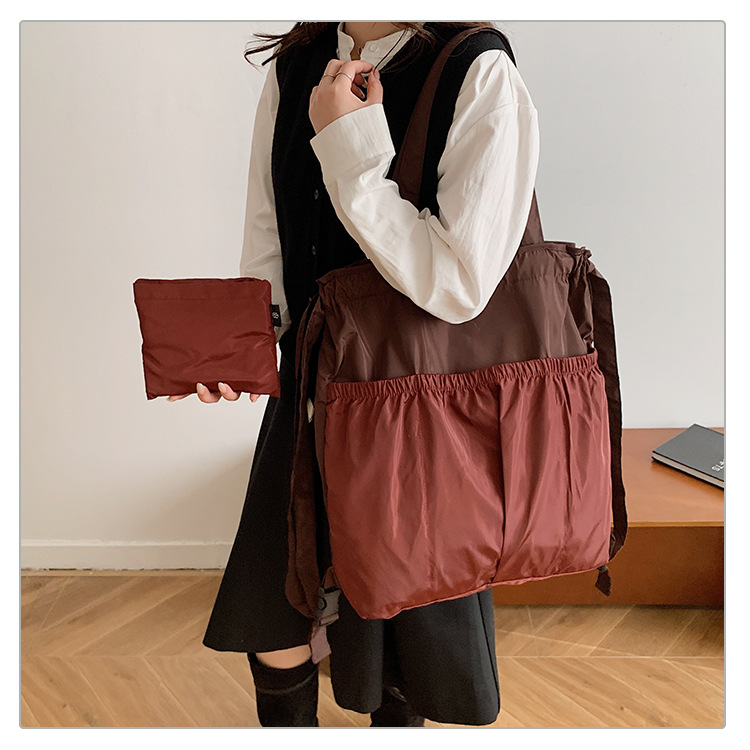 新款单肩包托特双肩折叠包手提简约通勤大容量时尚便携详情43