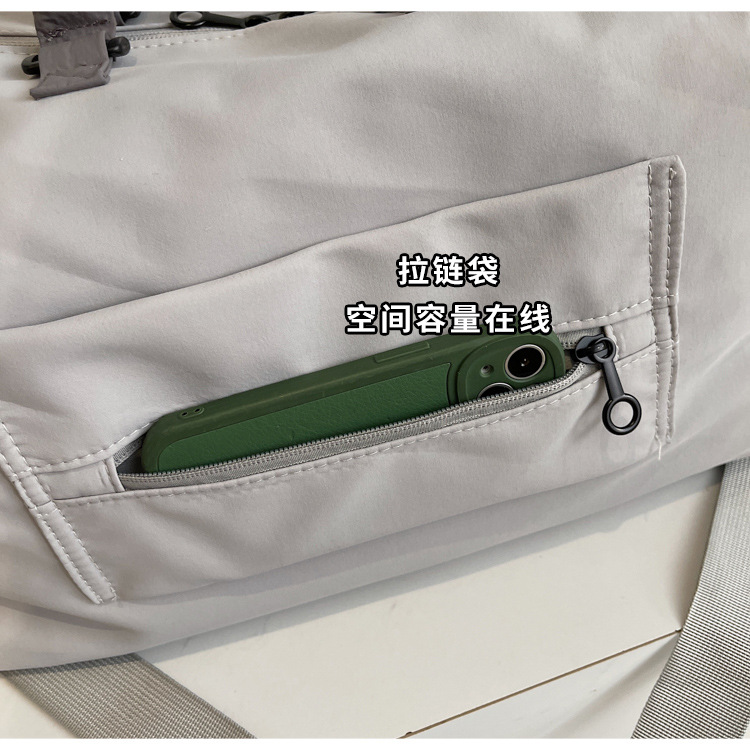 短途旅行包女轻便多功能斜挎运动健身包手提出差大容量收纳行李袋详情9