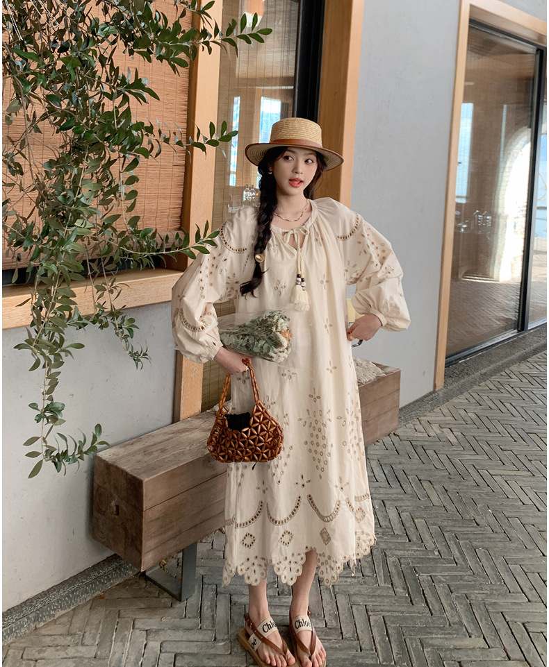 Real photo of a retro, gentle, cut-out embroidered V-neck apricot-colored dress, 2025 new seaside vacation style long-sleeved umbrella dress pic 49
