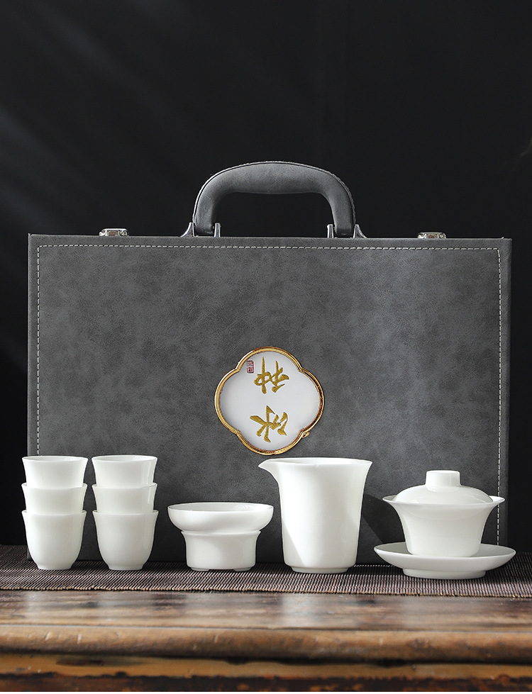 Dehua Light luxury sheep fat jade white porcelain ice jade porcelain tea set, home gift covered bowl Tea cup complete set as a souvenir pic 7