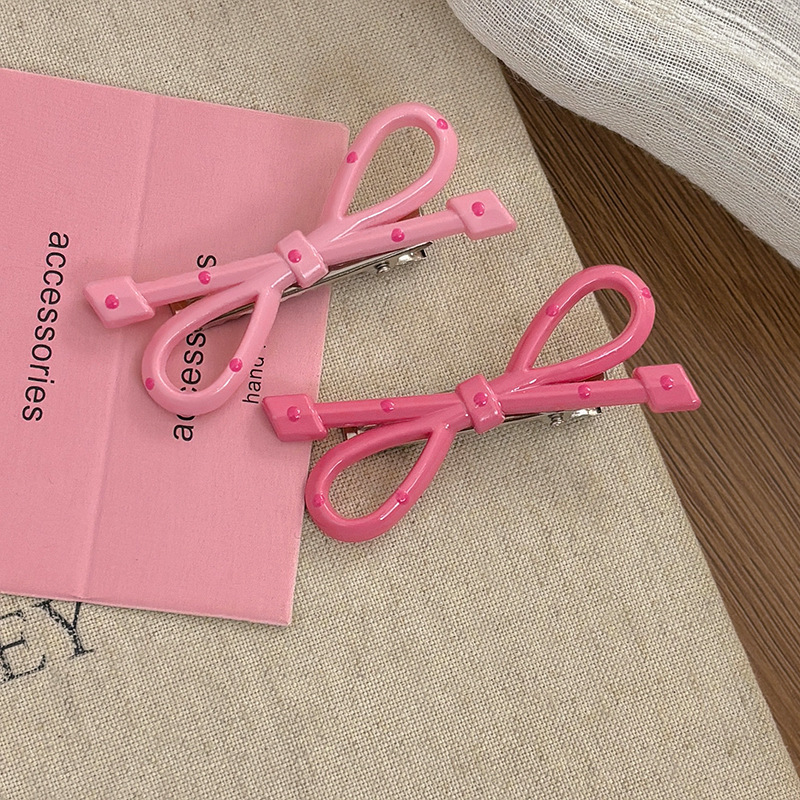 甜美波点蝴蝶结椭圆发夹女前额侧边刘海夹碎发鸭嘴夹儿童发卡头饰详情10