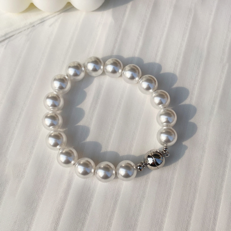 This is a trendy accessory for women, featuring a strong Australian white round magnetic pearl bracelet. It exudes a light luxury, niche and high-end vibe pic 35