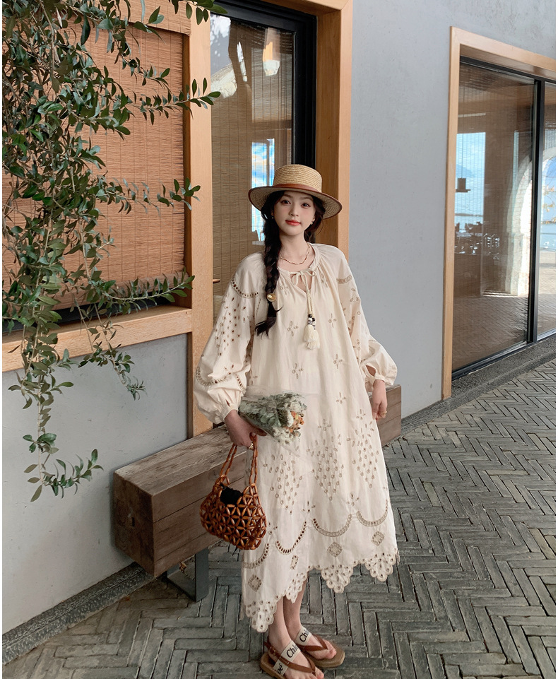 Real photo of a retro, gentle, cut-out embroidered V-neck apricot-colored dress, 2025 new seaside vacation style long-sleeved umbrella dress pic 47