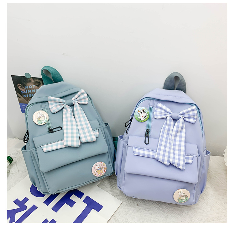 蝴蝶结书包女小学生大容量三到六年级初中轻便减负可爱简约双肩包详情10