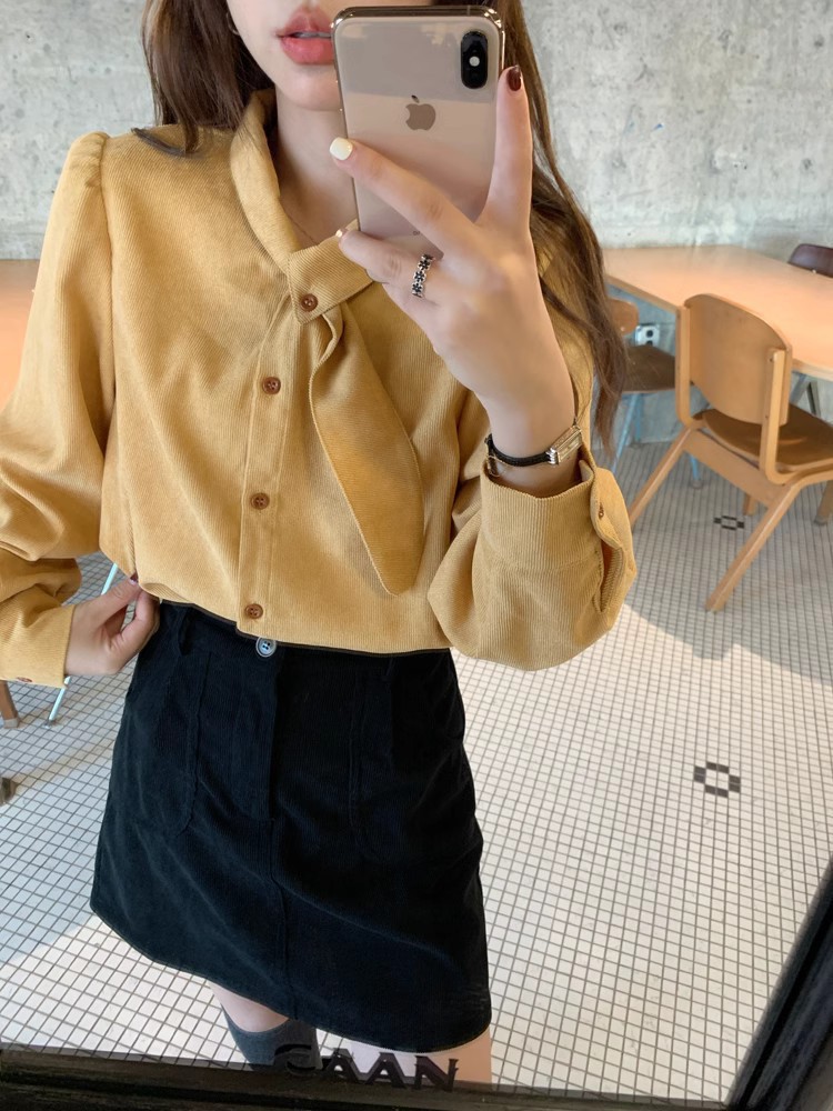 A French retro white bow tie top for women in autumn and winter, paired with a puffed-sleeve corduroy shirt and a stylish inner shirt pic 5