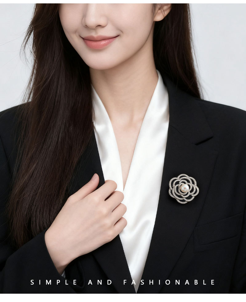 A light luxury and elegant camellia brooch with a high-end feel. It features a copper alloy freshwater pearl inlaid with zircon and a three-dimensional hollowed-out brooch pic 8