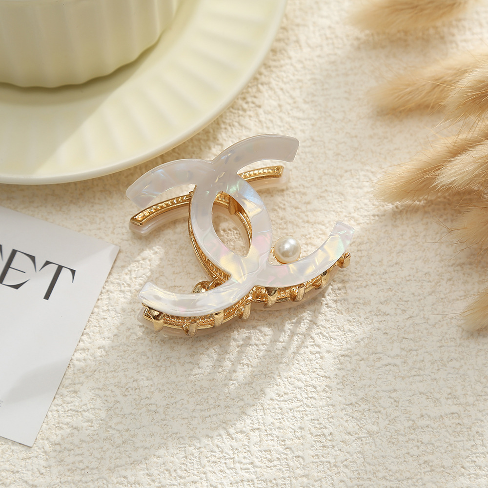 气质双C醋酸珍珠交叉抓夹半丸子头后脑勺盘发夹子鲨鱼夹现货批发详情7