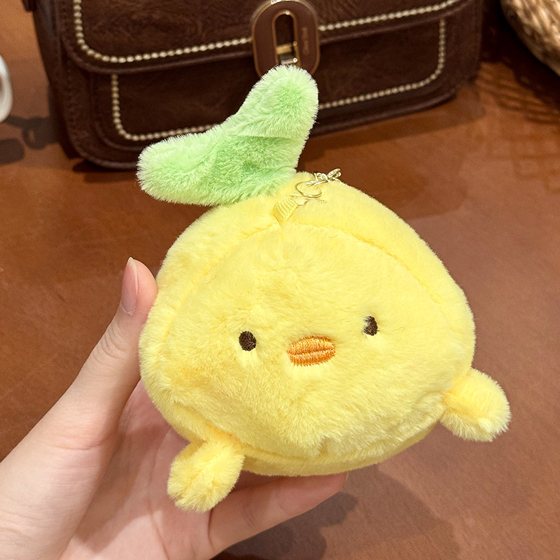 The little cat doll that wags its tail by pulling a rope is called the popular little white rabbit plush toy backpack doll at the street stall pic 3