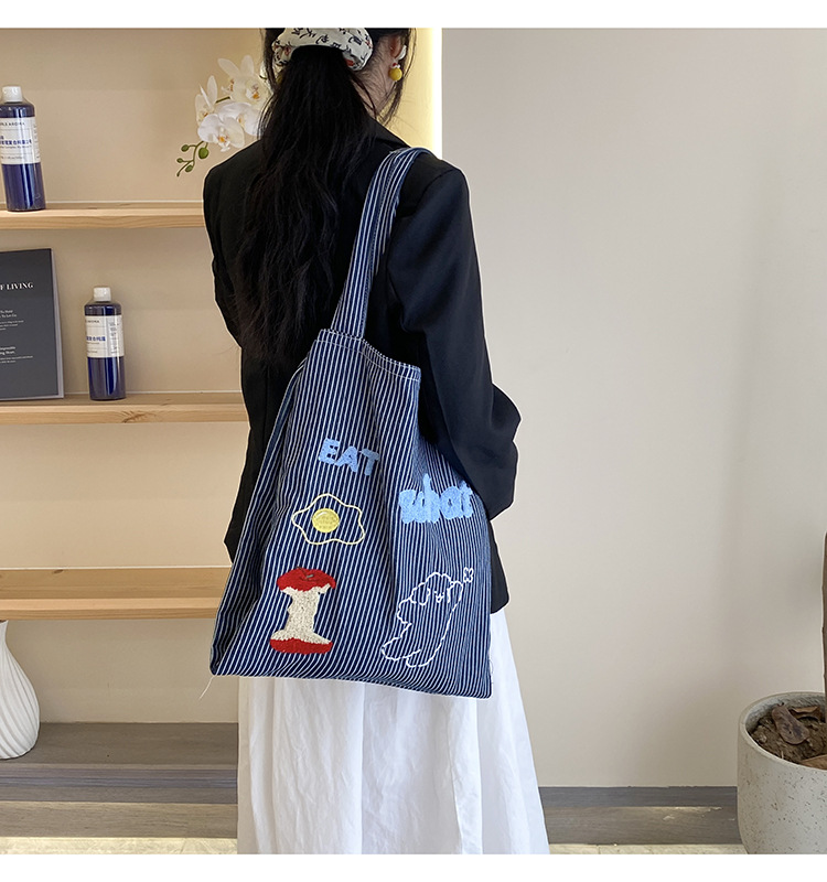 韩版时尚条纹帆布包包女2024新款大容量通勤托特包小众休闲布包详情11