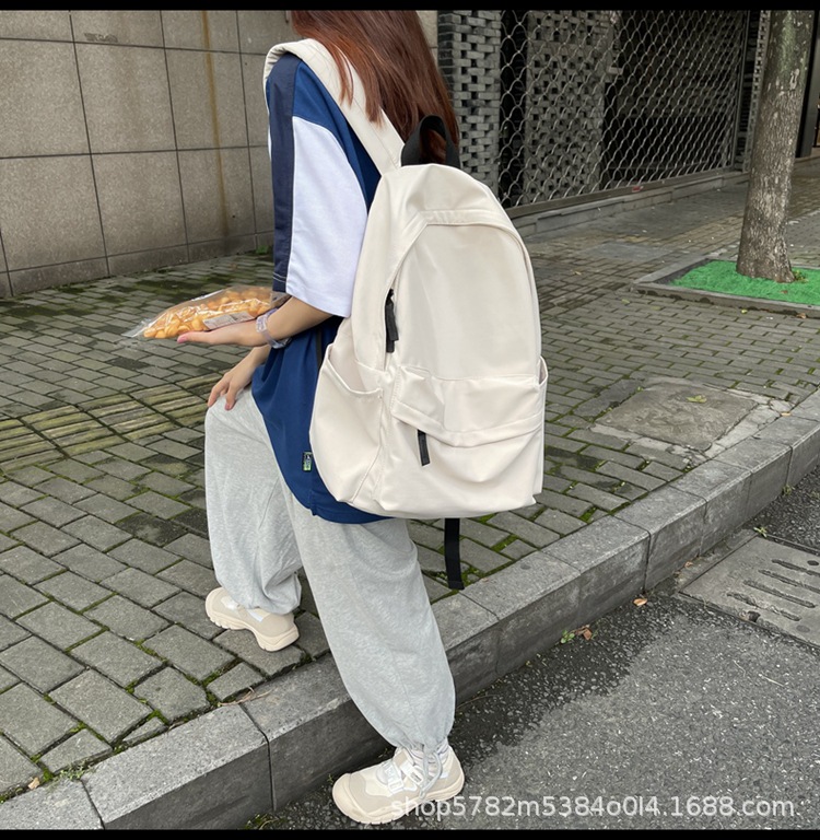 韩版男女同款大容量纯色背包新款简约学院风书包日系无印风双肩包详情8
