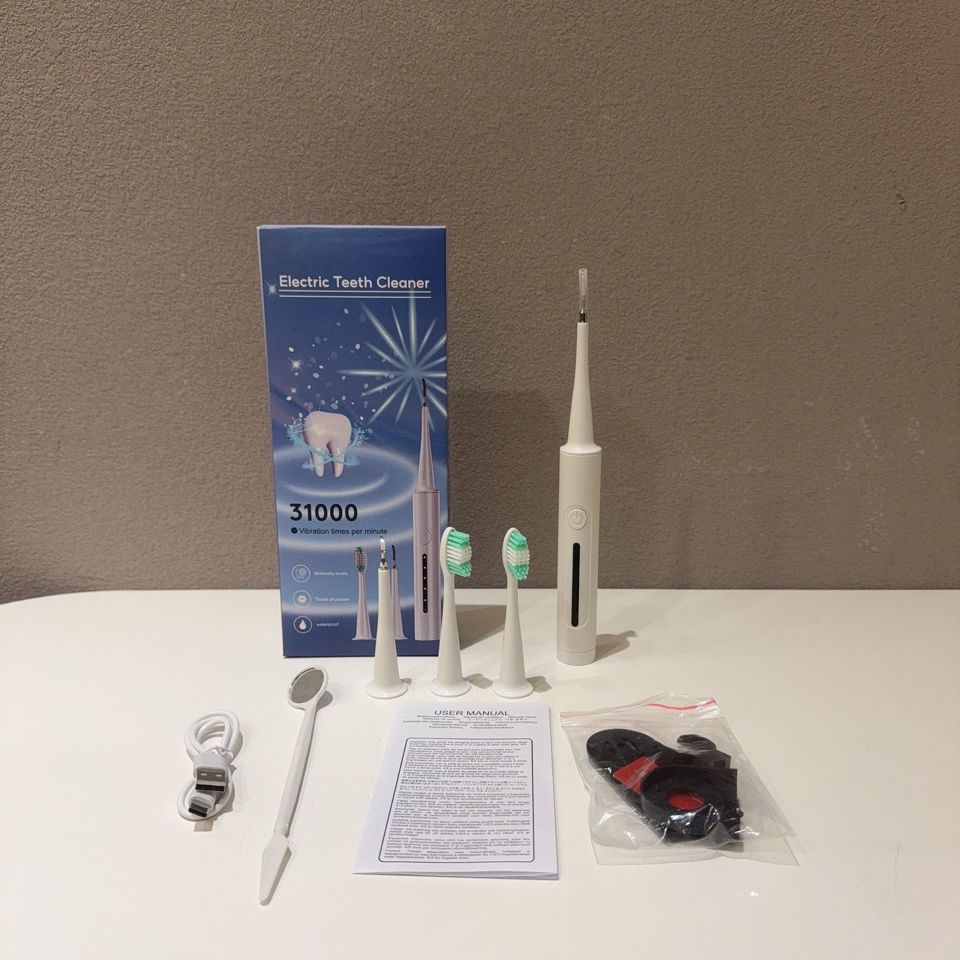 A popular foreign trade product, the six-in-one electric toothbrush set, portable tartar removal, teeth cleaning and beauty device pic 17
