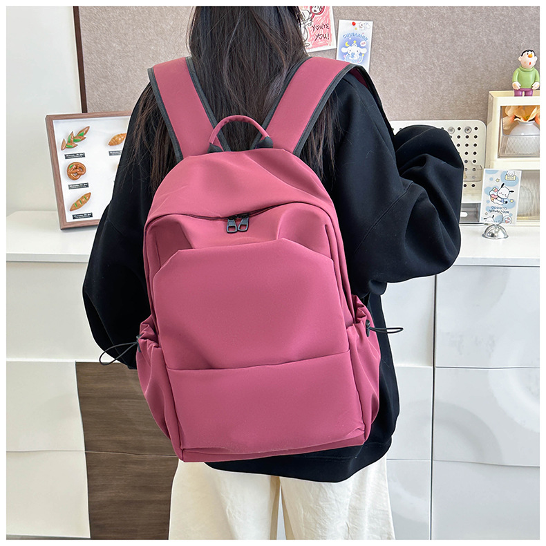 New large-capacity solid color backpacks for girls in foreign trade, simple and elegant school bags for junior and senior high school students pic 14