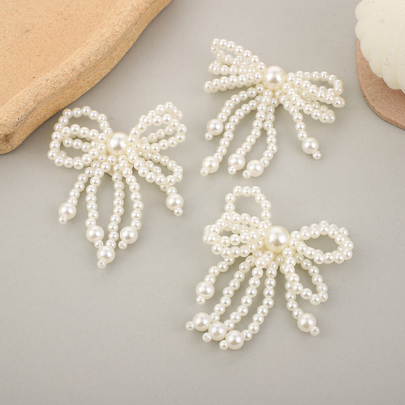 Factory wholesale of hand-woven pearl hair clips, material accessories, hand-sewn bow pendants, corsage accessories and accessories pic 2