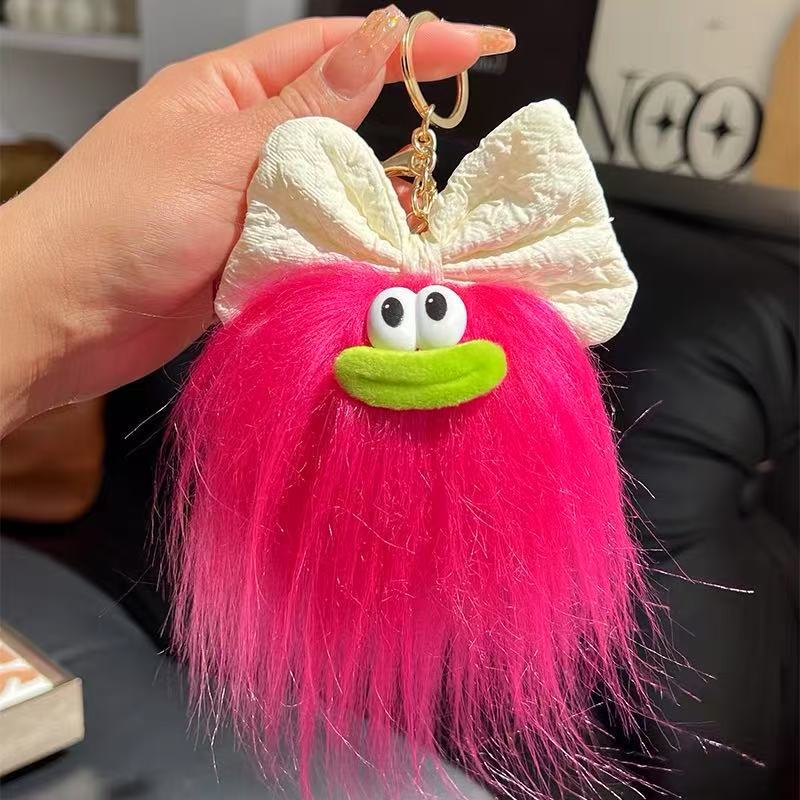 可爱蝴蝶结怪兽娃娃钥匙扣卡通搞怪毛绒书包挂件丑萌玩偶挂饰礼品详情14