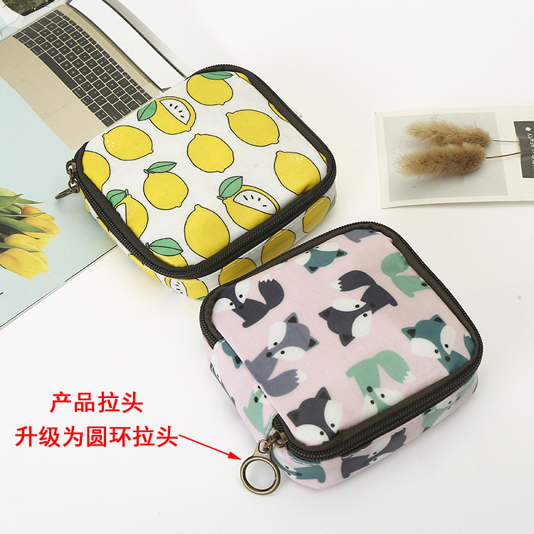 厂家直销韩国布艺防水大容量拉链卫生棉包姨妈巾化妆品收纳零钱包详情1