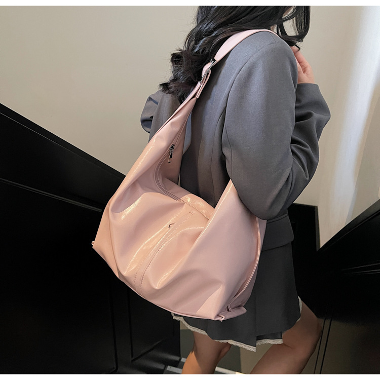 大容量腋下包女2025新款春夏季休闲百搭单肩斜挎包流行通勤饺子包详情17