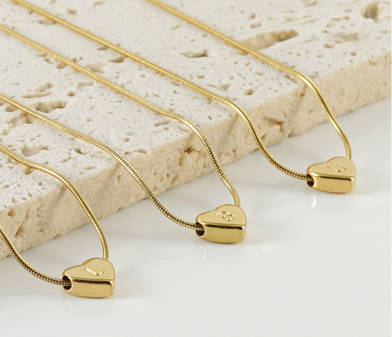 Cross-border European and American stainless steel heart-shaped letter pendant for women, 18k fashionable and versatile snake bone chain letter titanium steel necklace for women pic 18