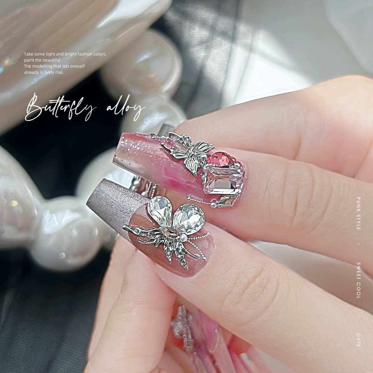 Wholesale of y2k liquid silver alloy butterfly wing hollowed-out mini bow tie nail accessories pic 4