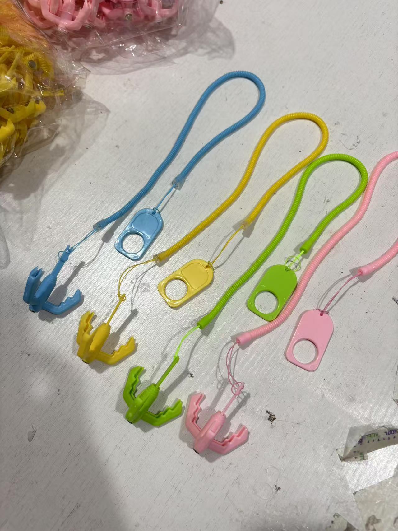 New trendy egg-shaped spring claw claw hook game prop, artist birthday gift, flying hook claw toy spring pic 8