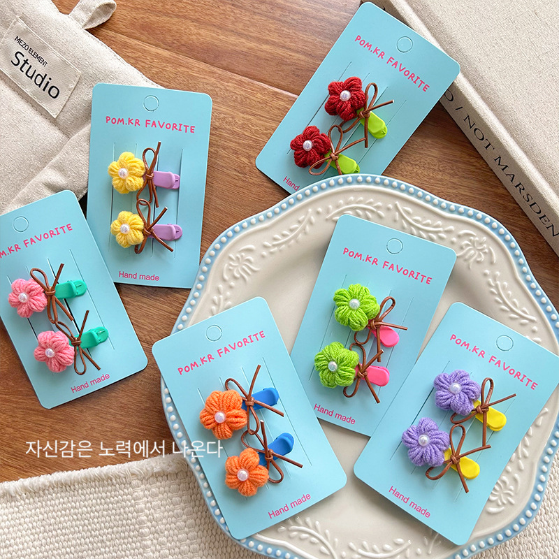 A new Korean knitted sweater, fashionable and cute, colorful flower bow clip, bangs clip, and a pair of broken hair clips for girls pic 3