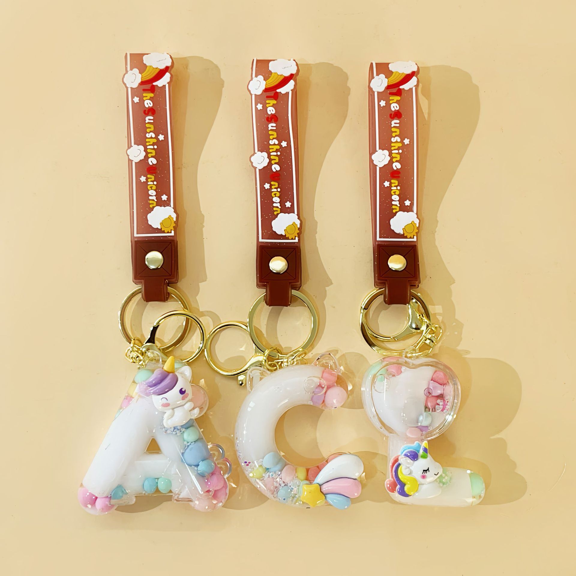 入油26字母钥匙扣包包挂件迷你流沙瓶情侣汽车钥匙链挂饰礼品批发详情13