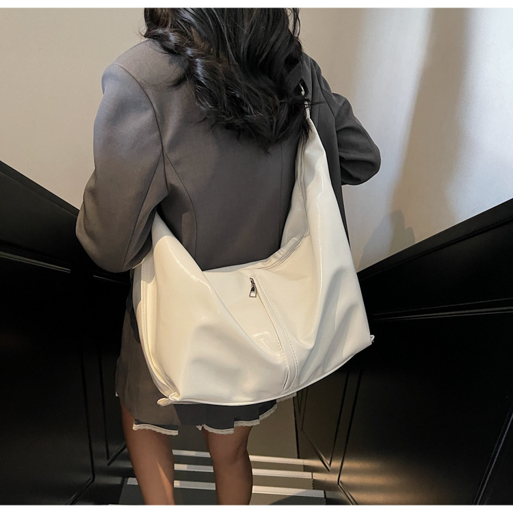 大容量腋下包女2025新款春夏季休闲百搭单肩斜挎包流行通勤饺子包详情22