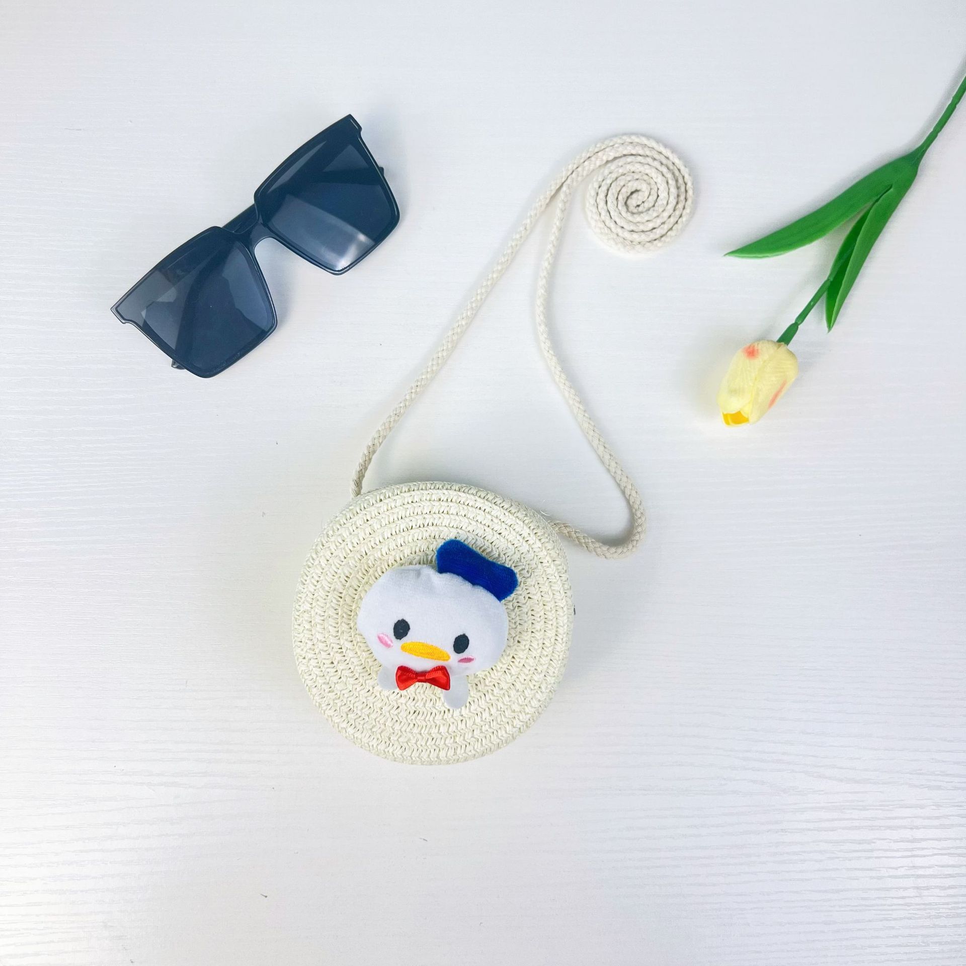 儿童手工编织包包可爱卡通猫草编小包男女童小圆包宝宝零钱包批发详情23