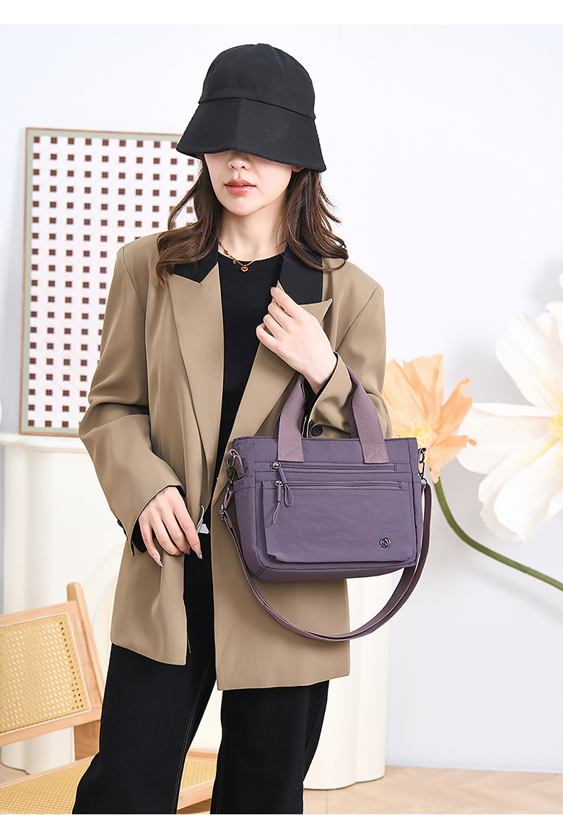 新款韩版单肩包简约潮搭斜挎包轻盈靓丽休闲包都市风尼龙手提女包详情23