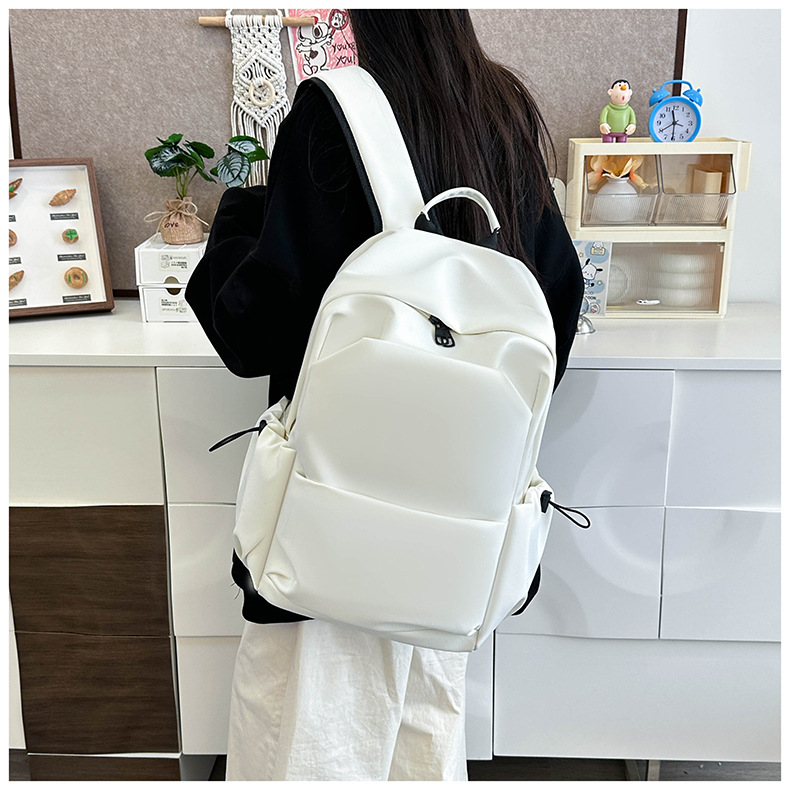 New large-capacity solid color backpacks for girls in foreign trade, simple and elegant school bags for junior and senior high school students pic 20