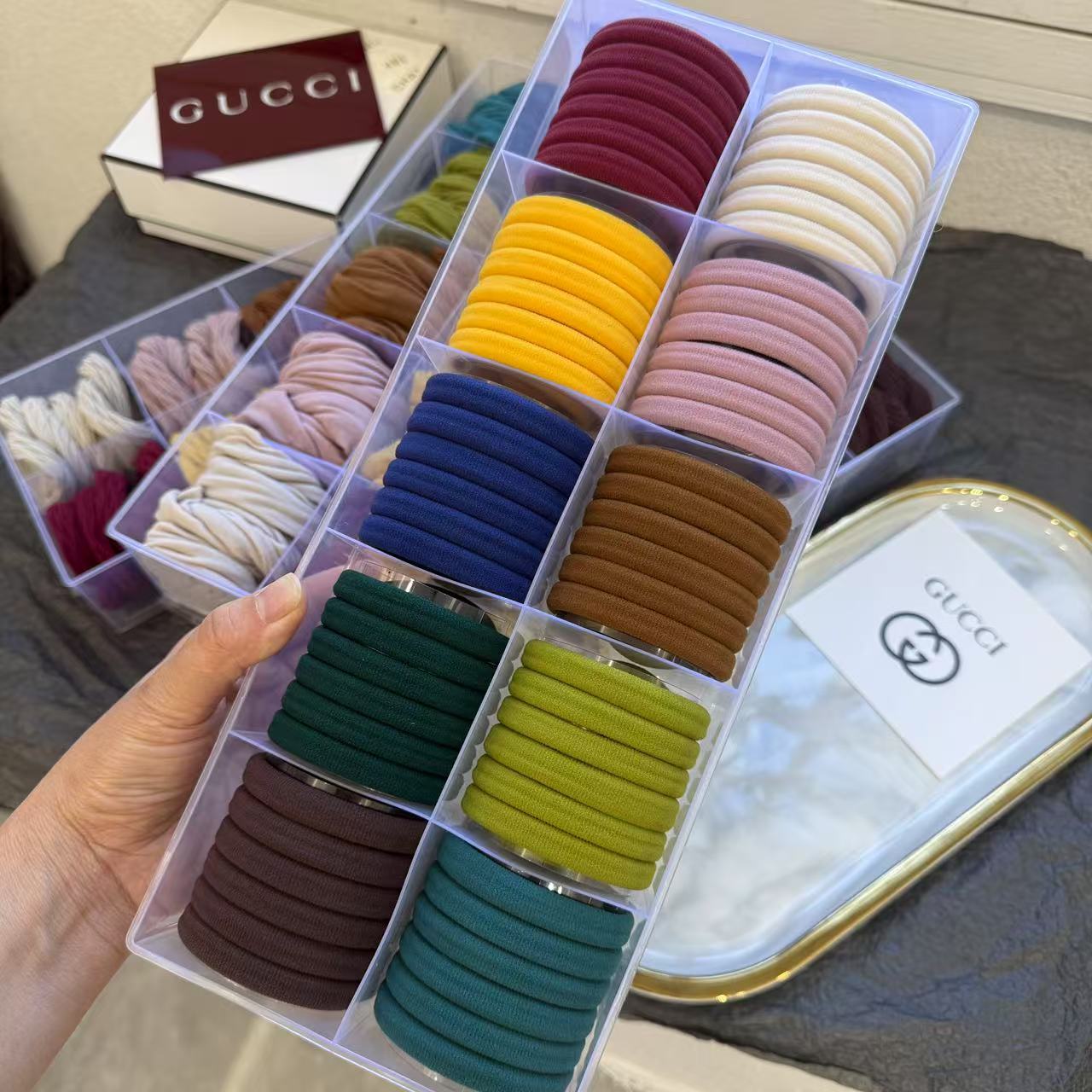 This is a real photo of a high-saturation, simple bow towel band for autumn and winter. The hair band is elastic and does not damage the hair. It is a fashionable and simple hair tie pic 7