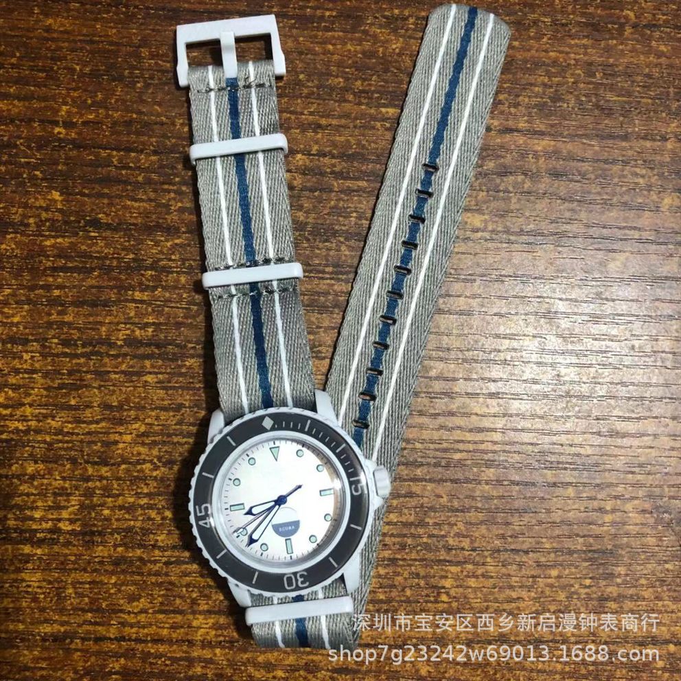 跨境爆款男女情侣五大洋石英联名款外贸热销海洋系列透底转盘手表详情9