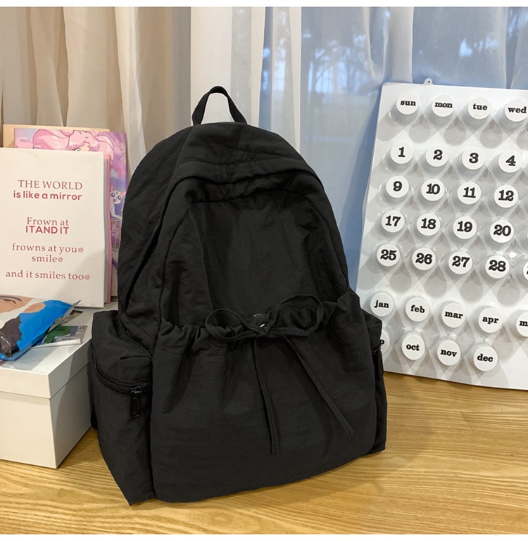 新款时尚轻便简约双肩包女日系文艺学生书包休闲运动旅行纯色背包详情41