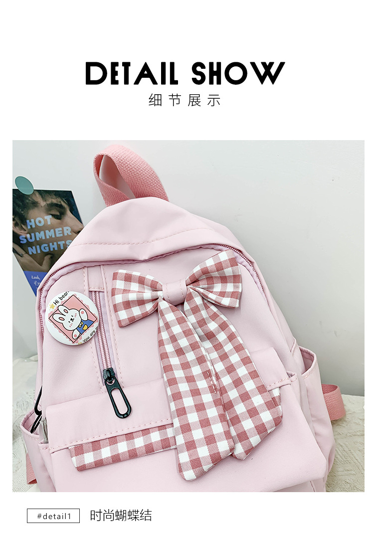 蝴蝶结书包女小学生大容量三到六年级初中轻便减负可爱简约双肩包详情24
