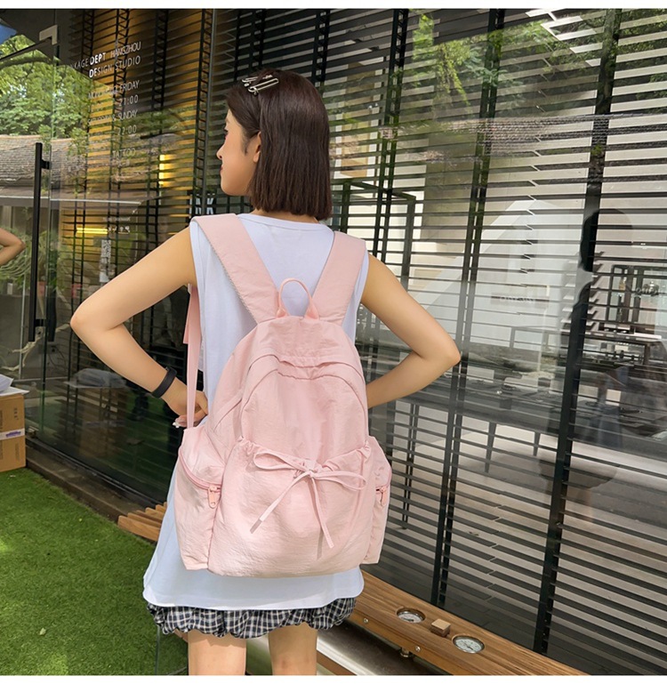 新款时尚轻便简约双肩包女日系文艺学生书包休闲运动旅行纯色背包详情19