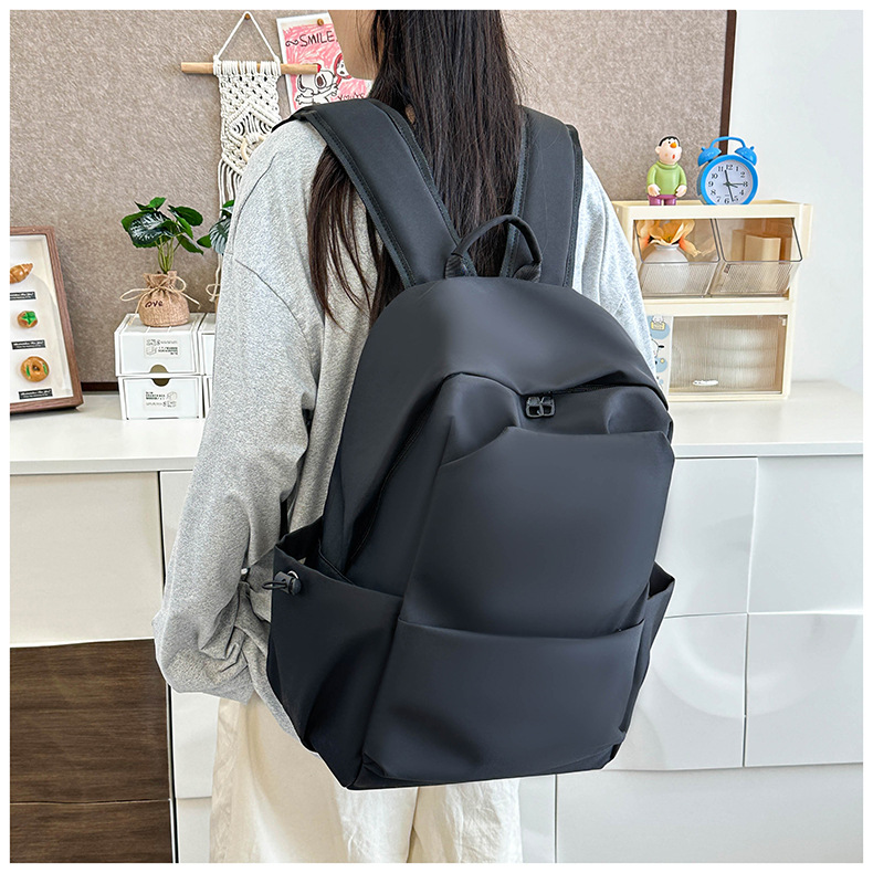 New large-capacity solid color backpacks for girls in foreign trade, simple and elegant school bags for junior and senior high school students pic 15