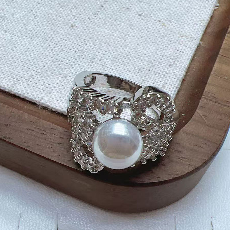Korean high-end pearl ring, light luxury and niche design, geometric diamond-encrusted round bead, cold style open ring for women pic 4