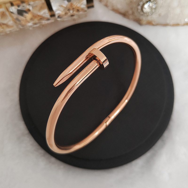 A classic 18k rose gold titanium steel bracelet that is a bestseller in Japan and South Korea. It is a unisex love nail bracelet that does not fade pic 24