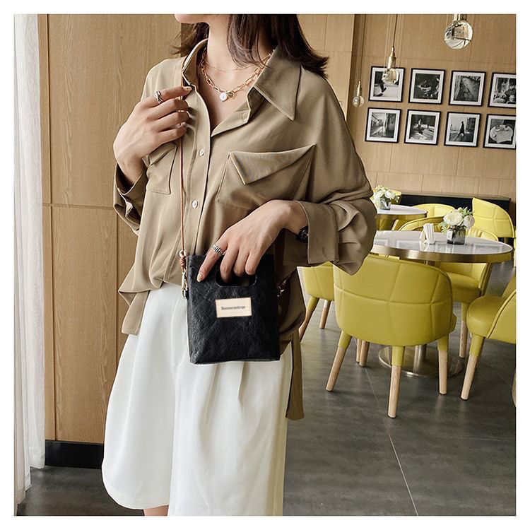 网红爆款小众复古杜邦纸mini手机包单肩斜挎包手提牛皮纸包超耐用详情7