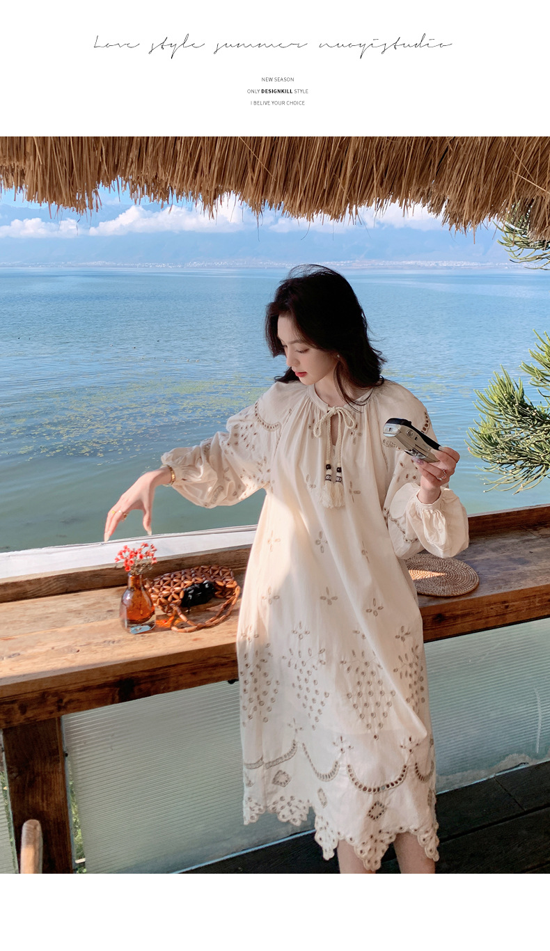 Real photo of a retro, gentle, cut-out embroidered V-neck apricot-colored dress, 2025 new seaside vacation style long-sleeved umbrella dress pic 10