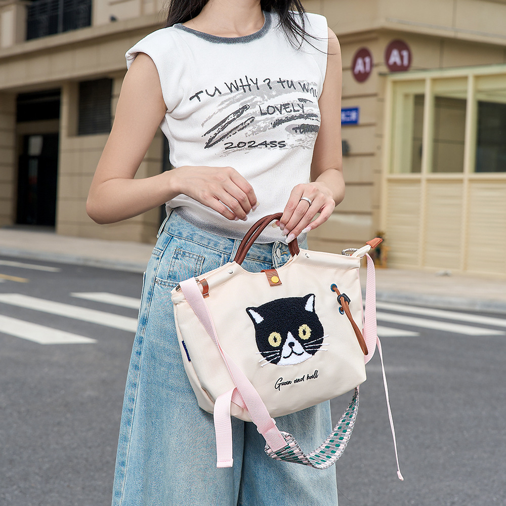 2025ins Japanese style new cute hand-carry small bag, portable for school, commuting and going out as a bento bag pic 9