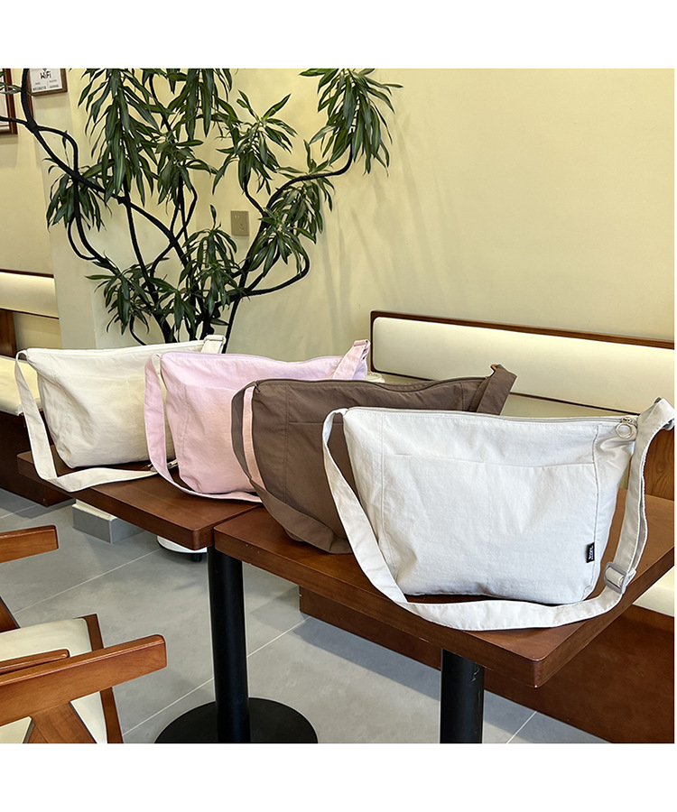 新潮斜挎邮差包日系休闲尼龙单肩托特包男女设计感小众通勤斜挎包详情1