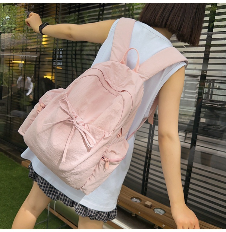 新款时尚轻便简约双肩包女日系文艺学生书包休闲运动旅行纯色背包详情20