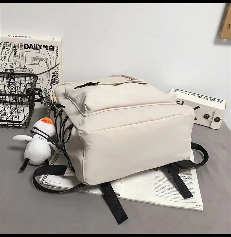 日系初高中学生上课书包男新款洋气质感纯色简约休闲女生双肩背包详情17